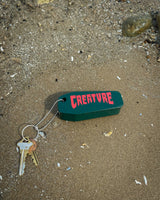 Creature Lost At Sea Dark Green Floatie Key Chain